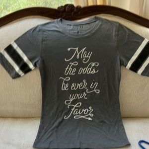 Super soft medium gunmetal T with fun message. Short sleeves w/bold stripes. New